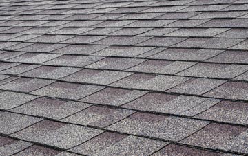 Skiprigg tiles for shallow pitch roofing